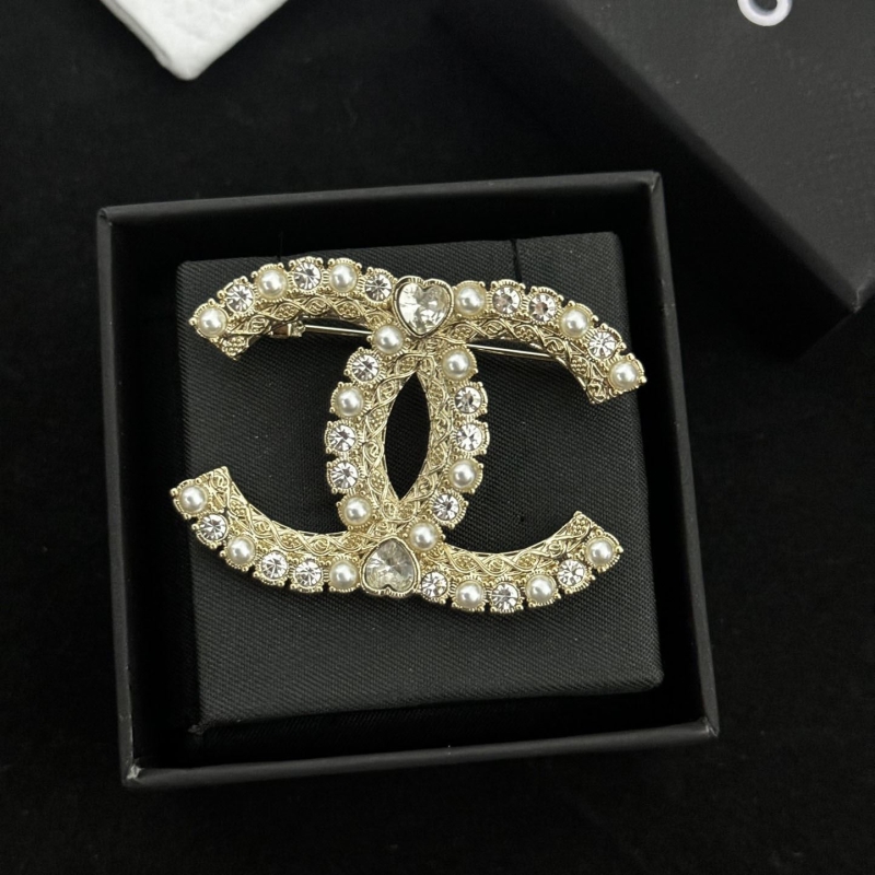 Ch**el brooches